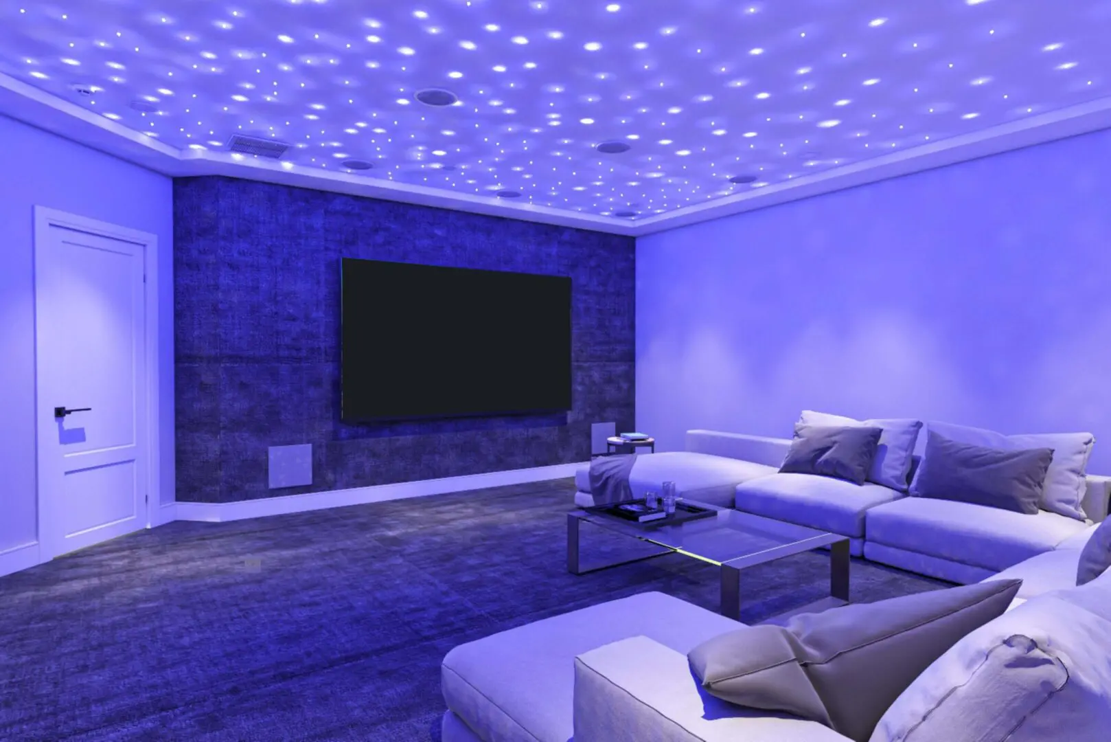 Modern living room with starry ceiling lights and cozy seating.