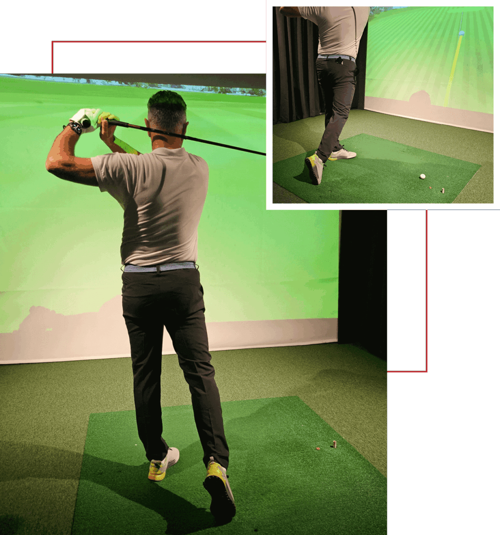 Man practicing golf swing indoors with a virtual screen.