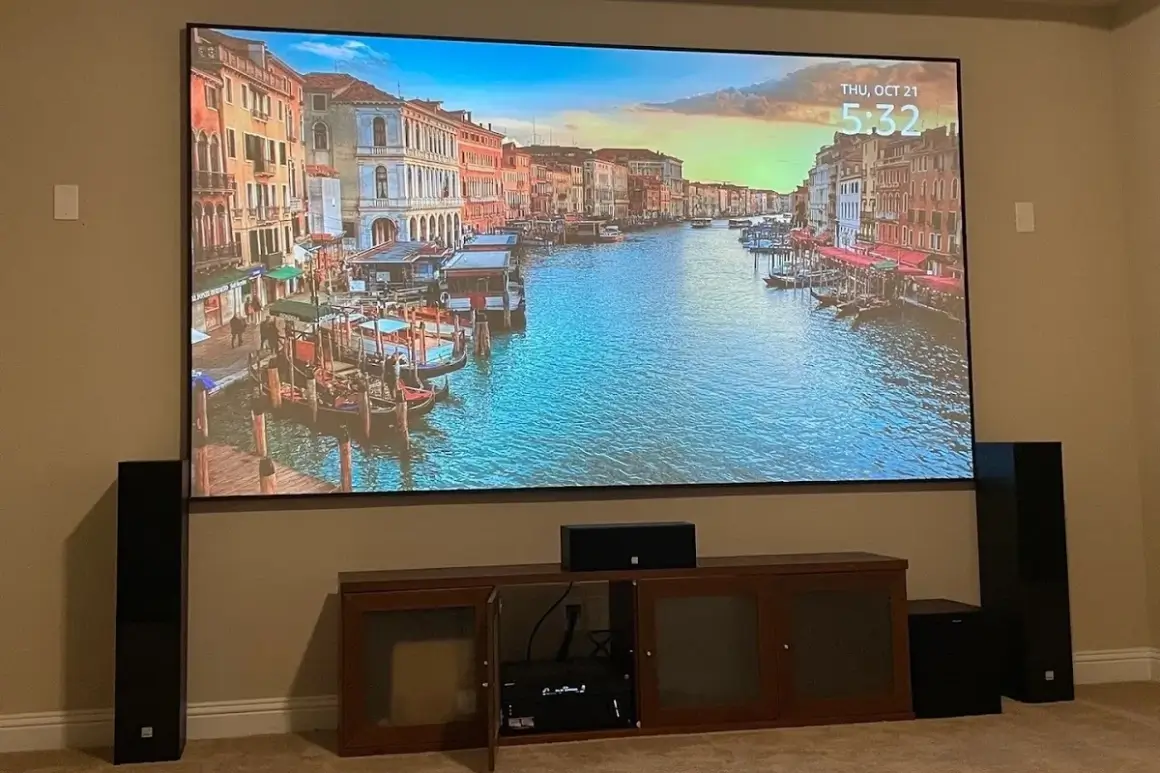 Home theater with scenic canal display.