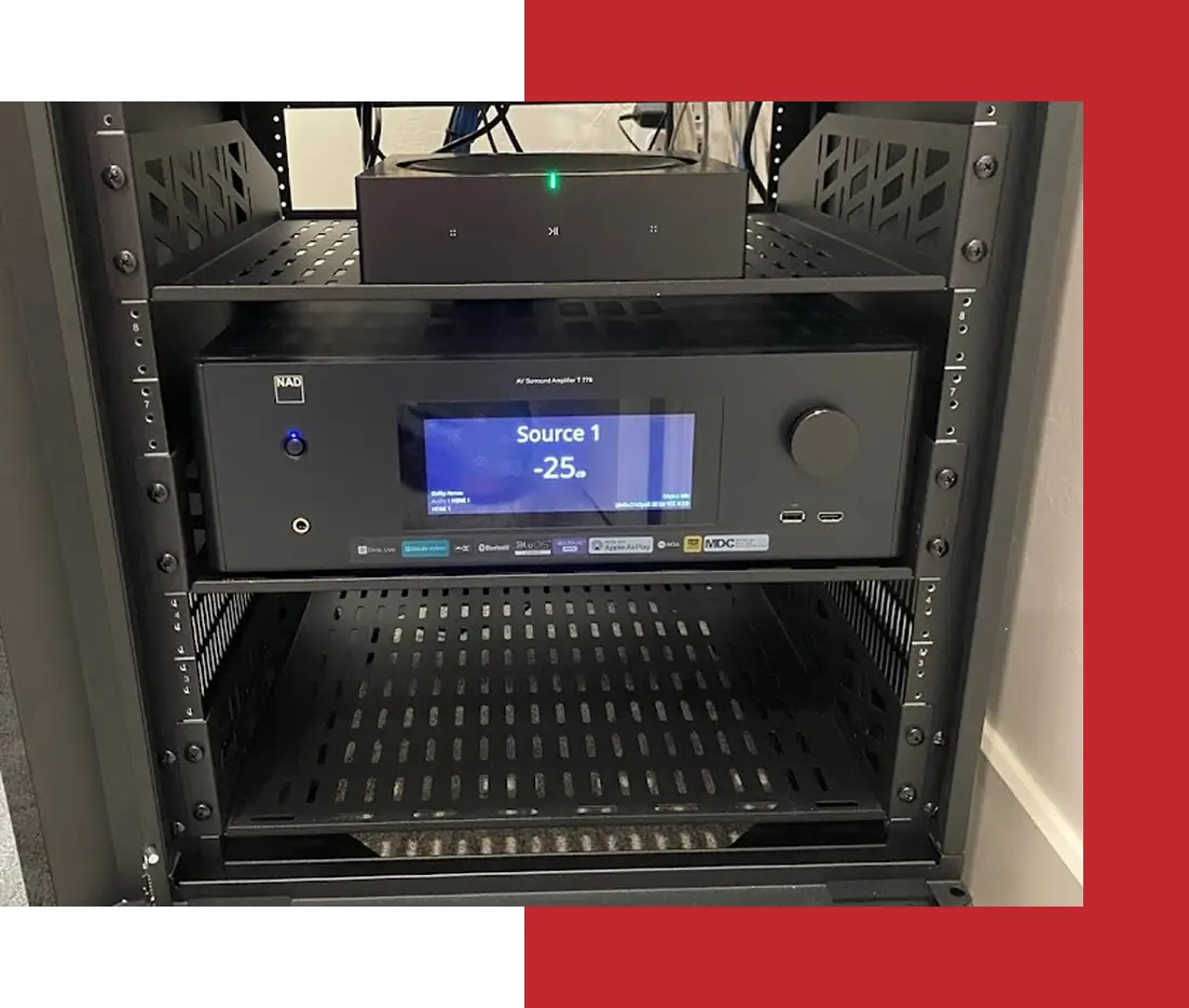 Audio equipment in a black rack enclosure.